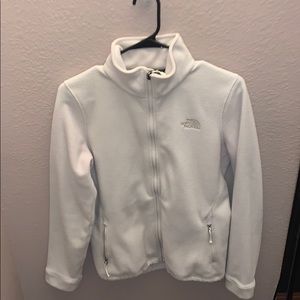 cream colored north face jacket